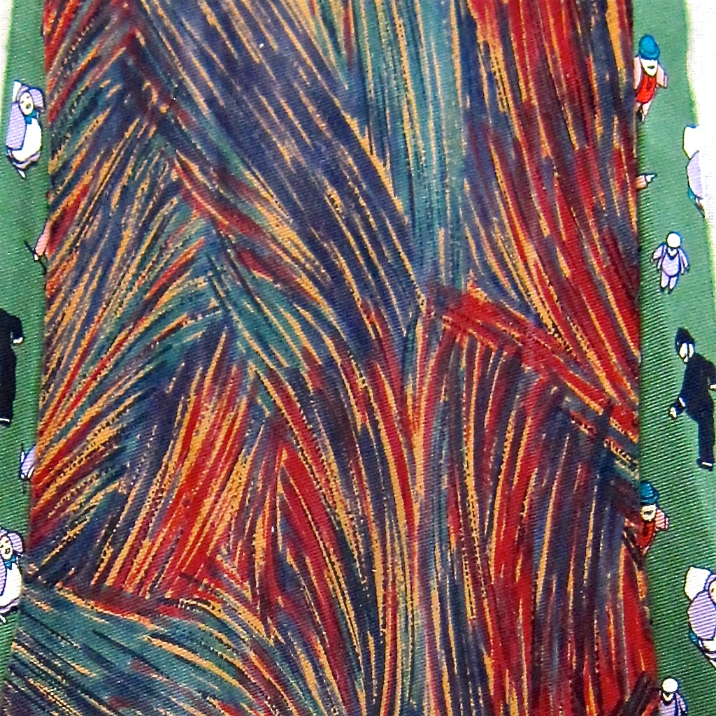 Image: two ties being made into one cravat