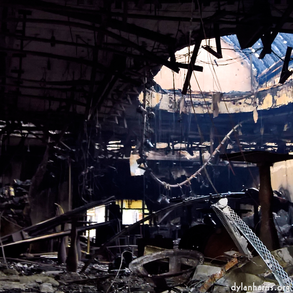 Image: a burnt down building