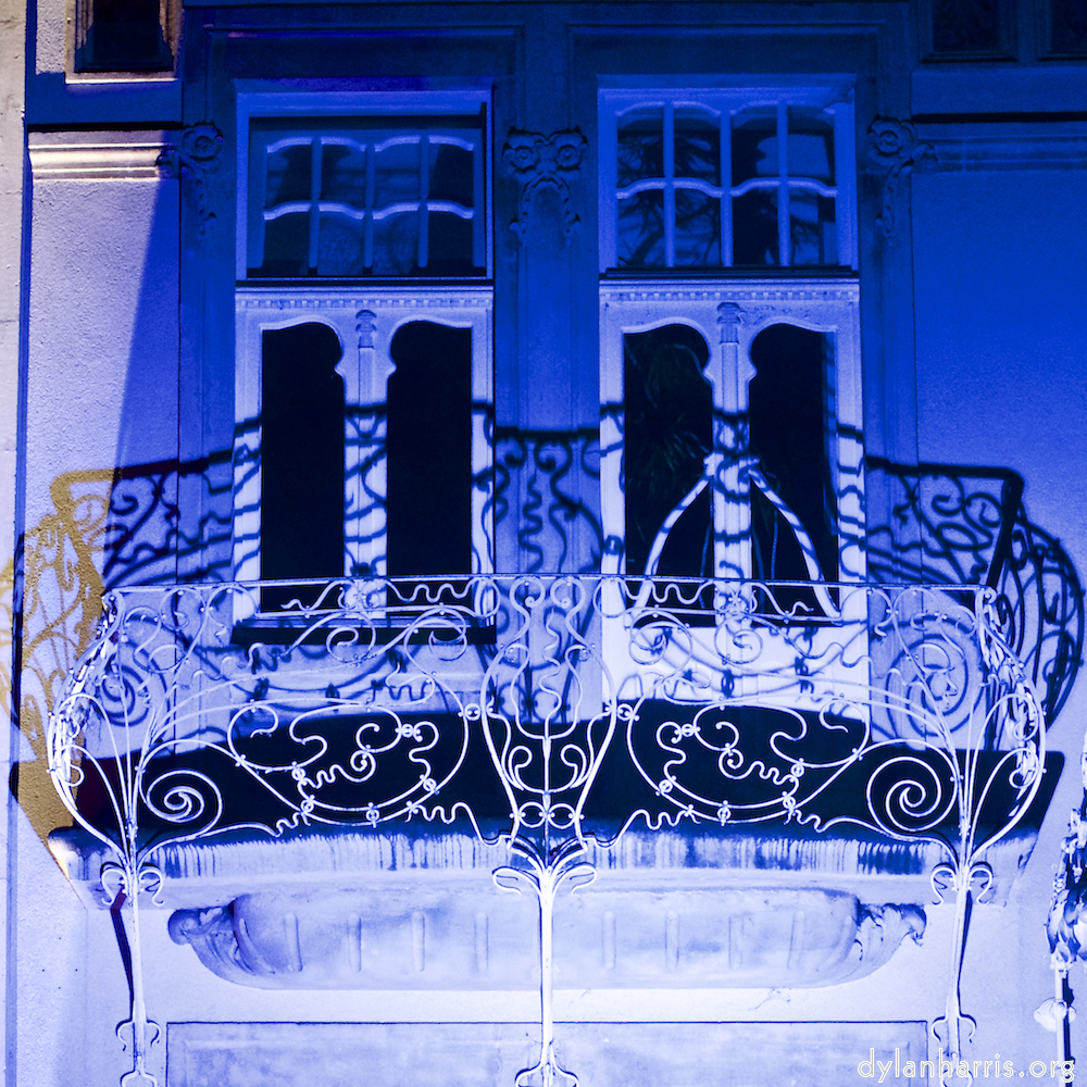 Image 'esch–sur–alzette (iv) 8', at Escher Déierepark, a does comes to see if I’ve a treat, while behind her others are fed. This is one of the series composed to hint there’s more to a photo than what’s seen.