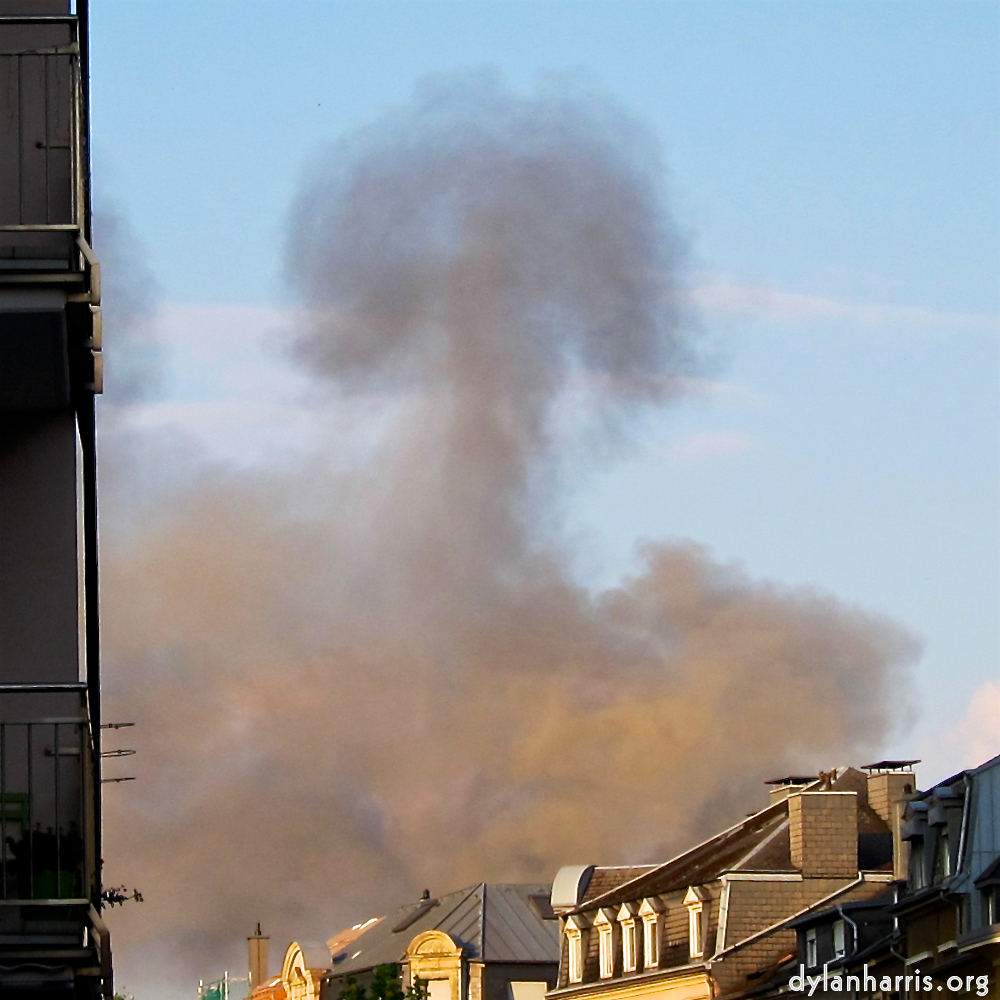 Image: smoke rises from a penthouse fire