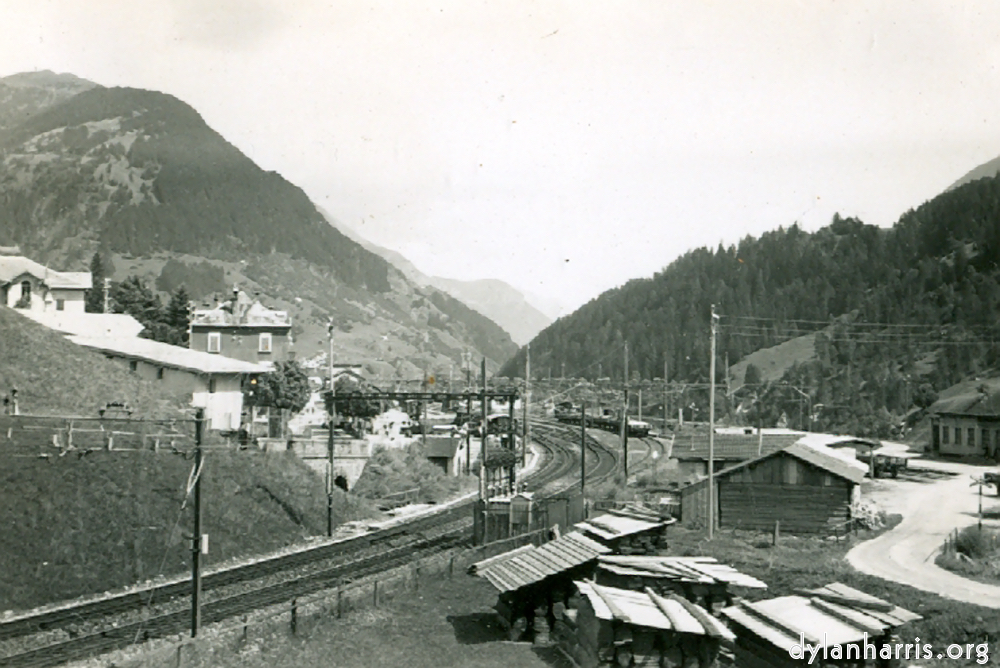 Image: Photo: Looking East from Airolo. Shewing the Railway just about to enter the Southern end of the Gotthard Tunnel.