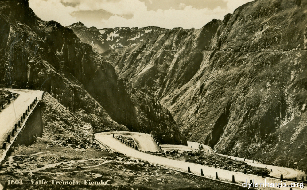 Postcard: Valle Tremola. Fiendo. [[ Gotthard - Airolo Road descending into the Tremola Valley. There are 42 Hairpin bends between Gotthard and Airolo. ]]