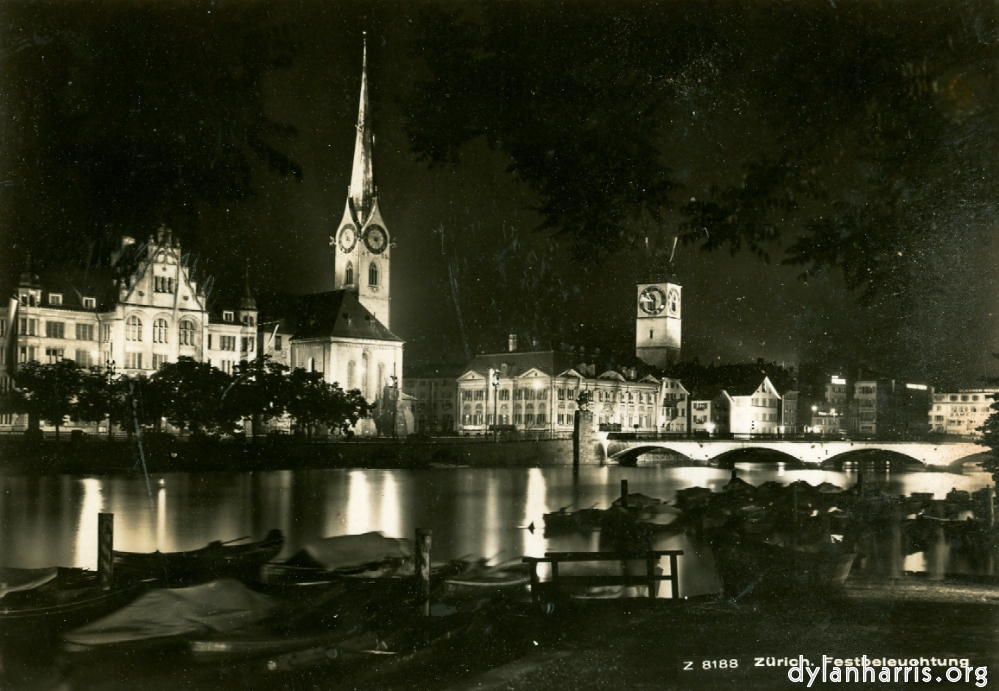 Image: Postcard: Z 8188 Zürich. Festbeleuchtung [[ Zürich by Night: St. Peters Church and the Urania Observatory from the Lummatquai. ]]